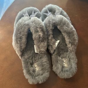 Ugg slippers.  Size 9 women’s.  New, no box. Flip flop style.  Gray.